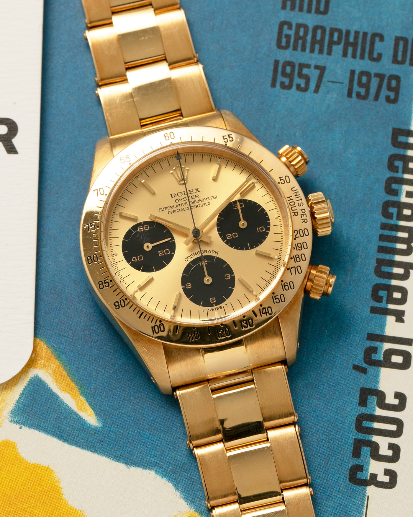 Brand: Rolex
Year: 1979
Model: Cosmograph Daytona
Serial Number: 595XXXX
Reference Number: 6265
Material: 18-carat Yellow Gold
Movement: Rolex Cal. 727 (Based on Valjoux Cal. 72), Manual-Winding
Case Diameter: 37.5mm x 13.5mm (Lug-to-Lug 45mm)
Lug Width: 19mm
Bracelet: Rolex Oyster Swiss Rivet Bracelet in 18-carat Yellow Gold with ‘57’ Curved End Links and Signed Clasp