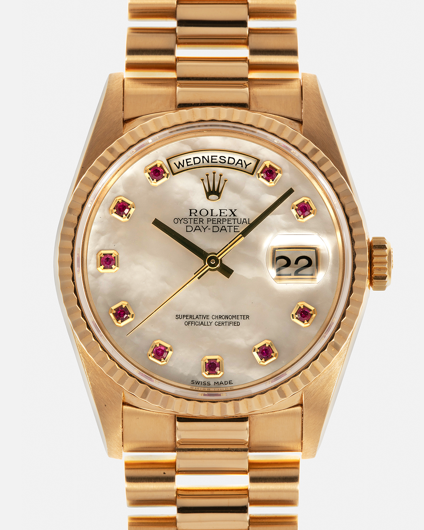 Brand: Rolex
Year: 1989
Model: Day-Date ‘Mother-of-Pearl Rubies’
Reference Number: 18238
Serial Number: L980XXX
Material: 18-carat Yellow Gold
Movement: Rolex Cal. 3155, Self-Winding
Case Dimensions: 36mm x 12mm (Lug-to-Lug 43.7mm)
Lug Width: 20mm
Bracelet: Rolex 18-carat Yellow Gold ‘8385’ Presidential Bracelet with 55B Curved End Links and Signed ‘O5’ Folding Clasp