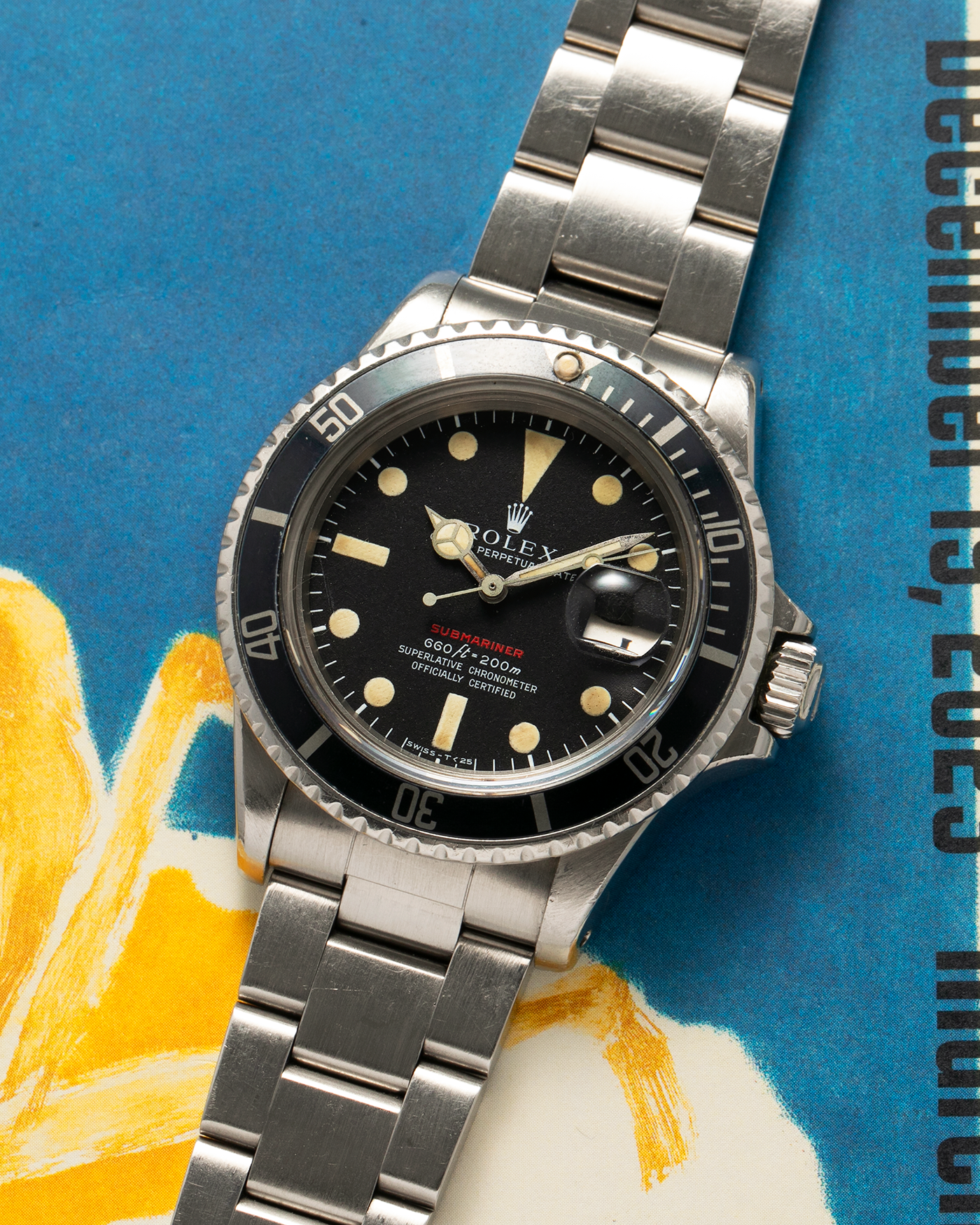 Brand: Rolex Year: 1970 Model: ‘Red’ Submariner Reference Number: 1680 Serial Number: 2437XXX Material: Stainless Steel Movement: Rolex Cal. 1570, Self-Winding Case Diameter: 40mm Lug Width: 20mm Bracelet: Rolex Stainless Steel ‘93150’ Oyster Bracelet with ‘580’ Endlinks