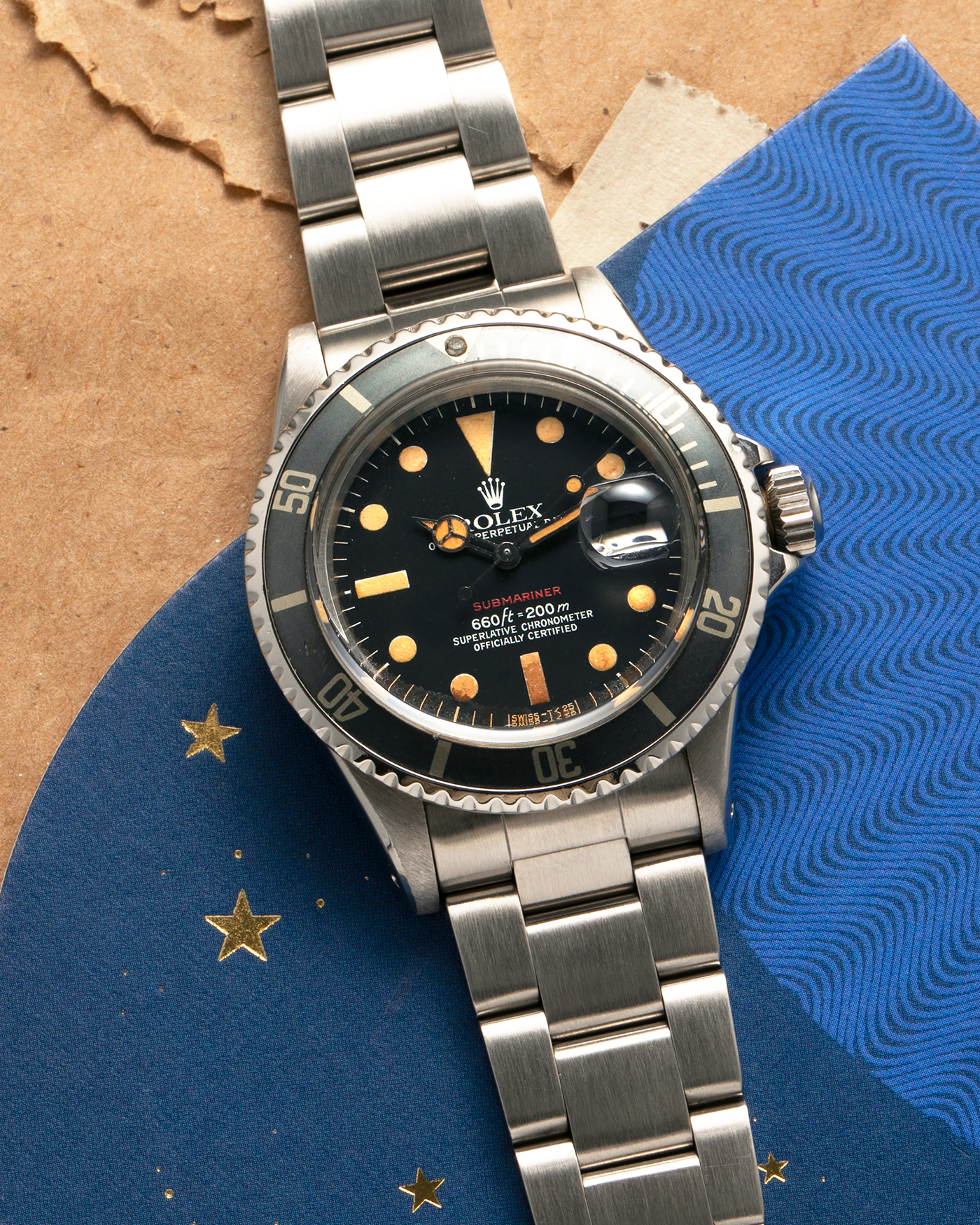 Brand: Rolex
Year: 1974
Model: ‘Red’ Submariner
Reference Number: 1680
Serial Number: 3740XXX
Material: Stainless Steel
Movement: Rolex Cal. 1575, Self-Winding
Case Diameter: 40mm x 14.8mm (with Crystal) (Lug-to-Lug 47.5mm)
Lug Width: 20mm
Bracelet: Rolex Stainless Steel ‘78360’ Oyster Solid Link Bracelet with ‘580’ Endlinks with ‘F’ Marked Folding Clasp