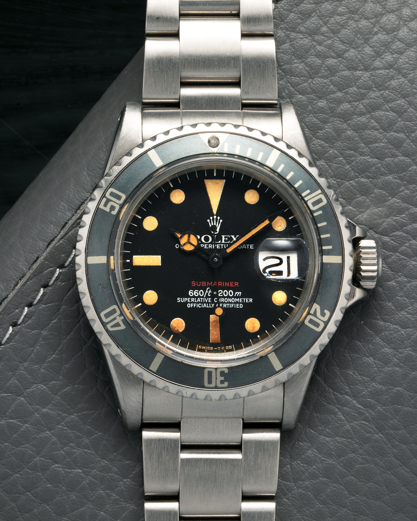 Brand: Rolex
Year: 1974
Model: ‘Red’ Submariner
Reference Number: 1680
Serial Number: 3740XXX
Material: Stainless Steel
Movement: Rolex Cal. 1575, Self-Winding
Case Diameter: 40mm x 14.8mm (with Crystal) (Lug-to-Lug 47.5mm)
Lug Width: 20mm
Bracelet: Rolex Stainless Steel ‘78360’ Oyster Solid Link Bracelet with ‘580’ Endlinks with ‘F’ Marked Folding Clasp