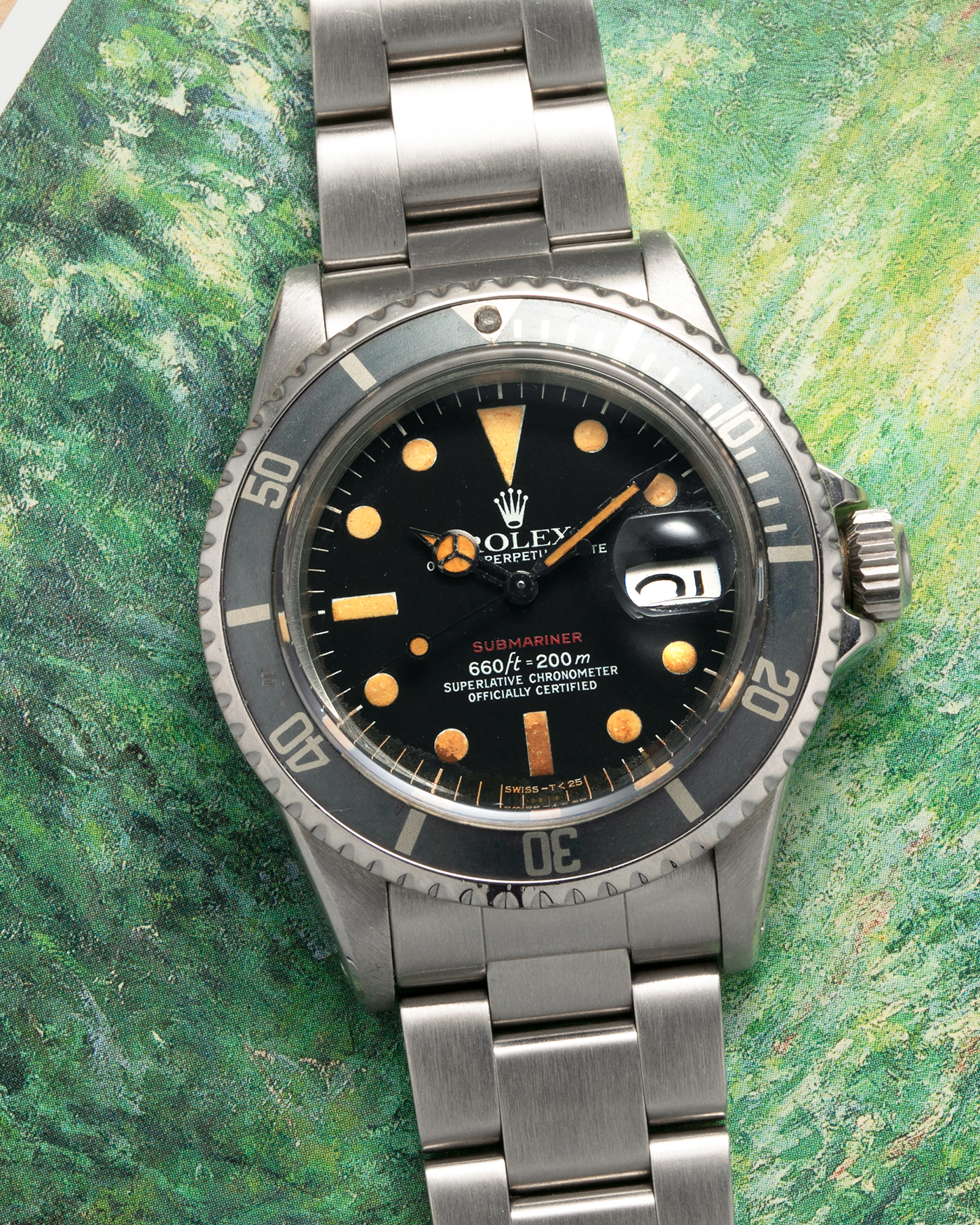 Brand: Rolex
Year: 1974
Model: ‘Red’ Submariner
Reference Number: 1680
Serial Number: 3740XXX
Material: Stainless Steel
Movement: Rolex Cal. 1575, Self-Winding
Case Diameter: 40mm x 14.8mm (with Crystal) (Lug-to-Lug 47.5mm)
Lug Width: 20mm
Bracelet: Rolex Stainless Steel ‘78360’ Oyster Solid Link Bracelet with ‘580’ Endlinks with ‘F’ Marked Folding Clasp