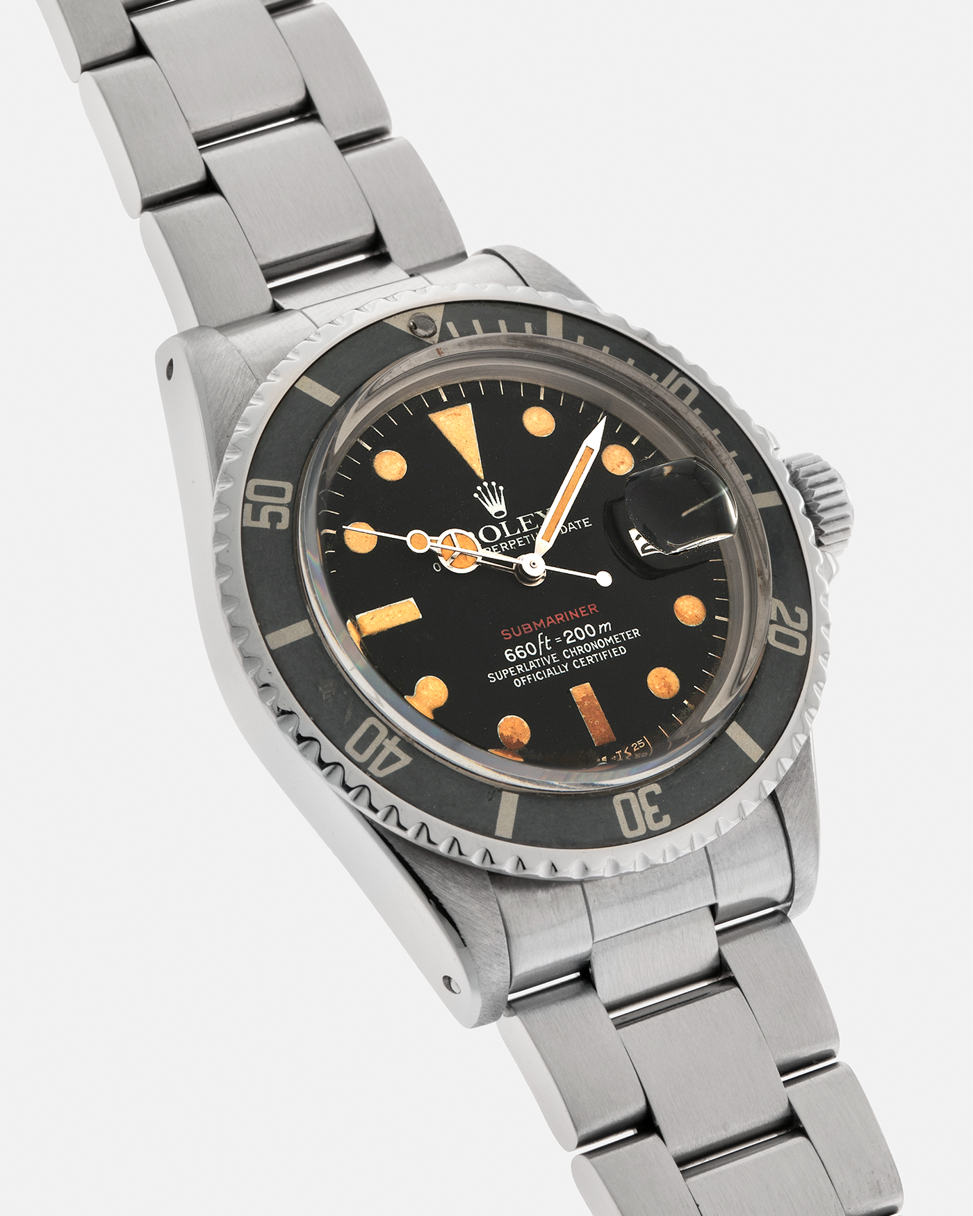 Brand: Rolex
Year: 1974
Model: ‘Red’ Submariner
Reference Number: 1680
Serial Number: 3740XXX
Material: Stainless Steel
Movement: Rolex Cal. 1575, Self-Winding
Case Diameter: 40mm x 14.8mm (with Crystal) (Lug-to-Lug 47.5mm)
Lug Width: 20mm
Bracelet: Rolex Stainless Steel ‘78360’ Oyster Solid Link Bracelet with ‘580’ Endlinks with ‘F’ Marked Folding Clasp