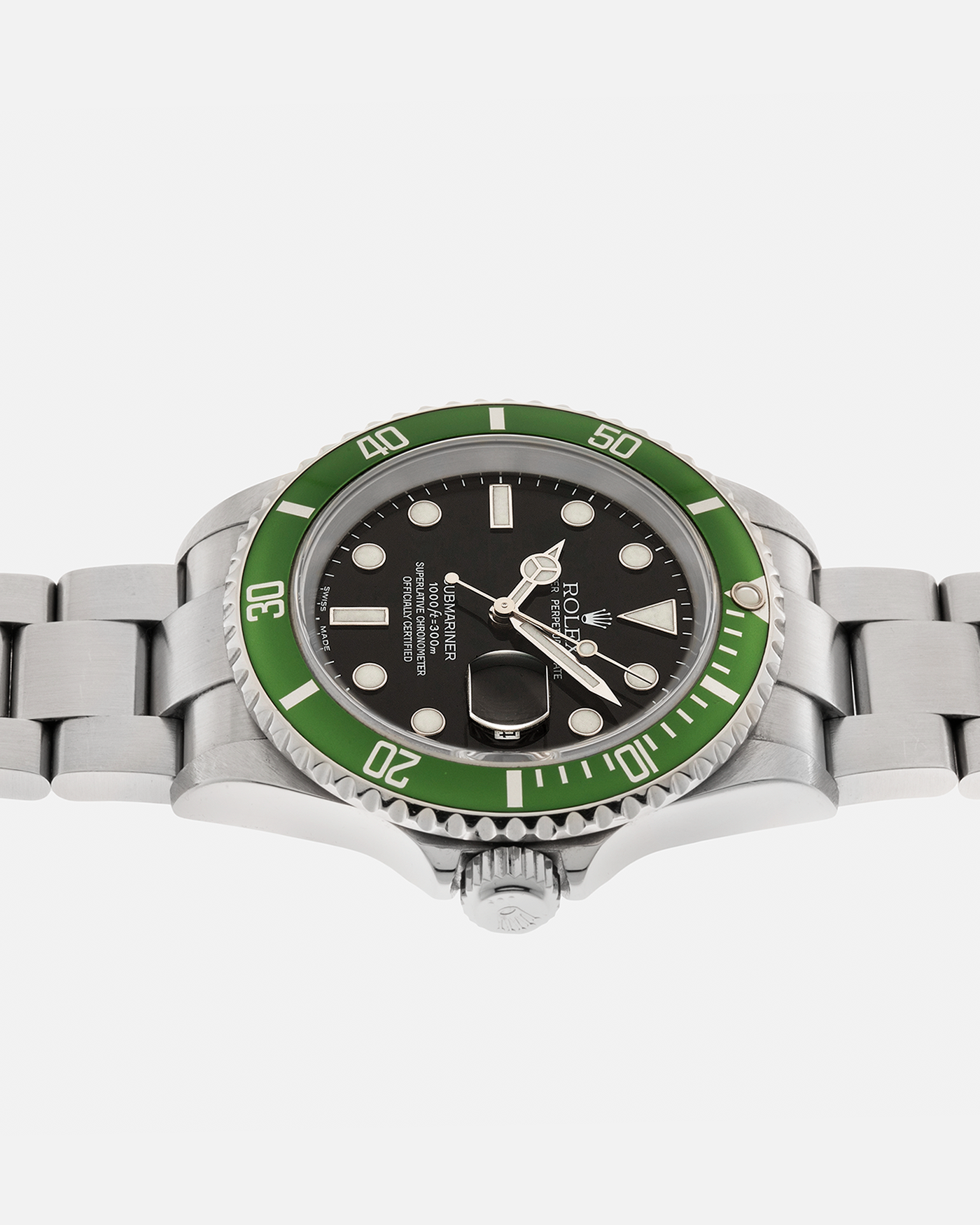 Brand: Rolex Year: 2004 Model: Submariner ‘Kermit’ Reference Number: 16610LV ‘Flat 4’ Serial Number: F Serial Material: Stainless Steel Movement: Rolex Cal. 3135, Self-Winding Case Diameter: 40mm Lug Width: 20mm Bracelet: Rolex Stainless Steel ‘93250’ Oyster Bracelet with signed ‘CL3’ Clasp