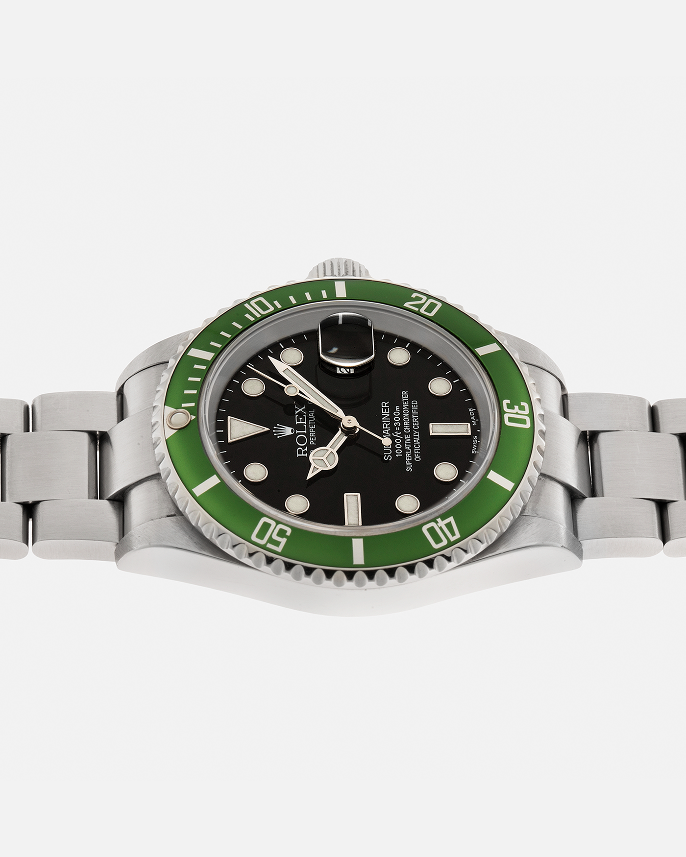 Brand: Rolex Year: 2004 Model: Submariner ‘Kermit’ Reference Number: 16610LV ‘Flat 4’ Serial Number: F Serial Material: Stainless Steel Movement: Rolex Cal. 3135, Self-Winding Case Diameter: 40mm Lug Width: 20mm Bracelet: Rolex Stainless Steel ‘93250’ Oyster Bracelet with signed ‘CL3’ Clasp