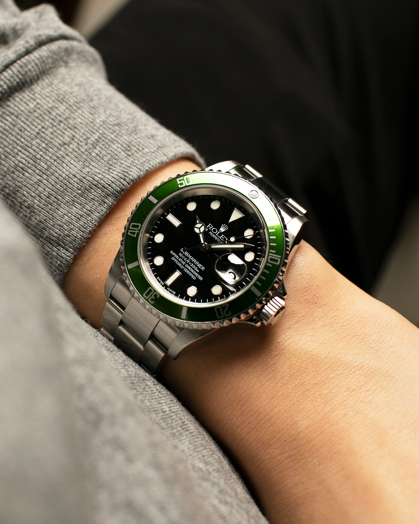 Brand: Rolex Year: 2004 Model: Submariner ‘Kermit’ Reference Number: 16610LV ‘Flat 4’ Serial Number: F Serial Material: Stainless Steel Movement: Rolex Cal. 3135, Self-Winding Case Diameter: 40mm Lug Width: 20mm Bracelet: Rolex Stainless Steel ‘93250’ Oyster Bracelet with signed ‘CL3’ Clasp