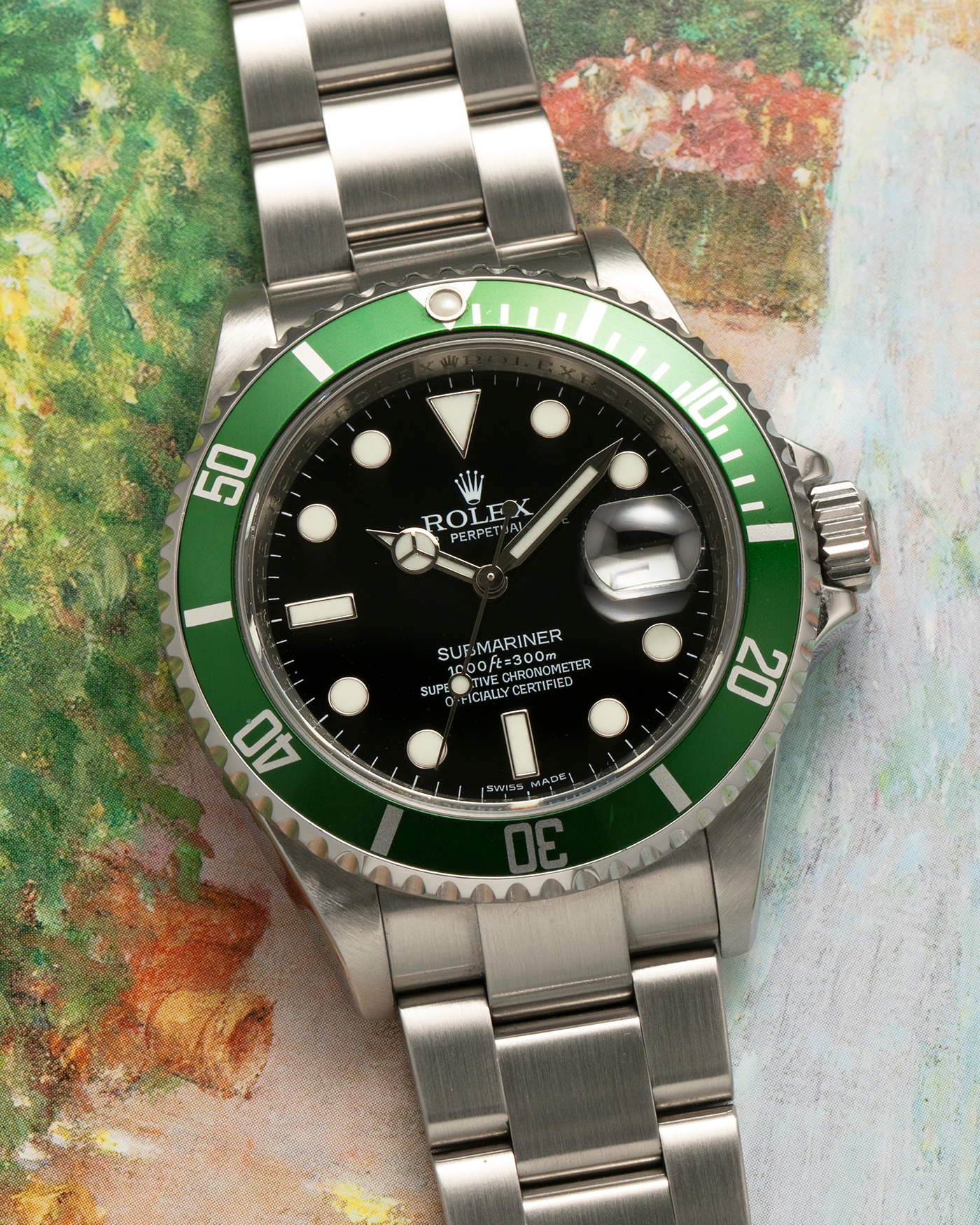 Brand: Rolex Year: 2010 Model: Submariner ‘Kermit’ Reference Number: 16610LV Serial Number: V618XXX Material: Stainless Steel Movement: Rolex Cal. 3135, Self-Winding Case Diameter: 40mm Lug Width: 20mm Bracelet: Rolex Stainless Steel Oyster Bracelet