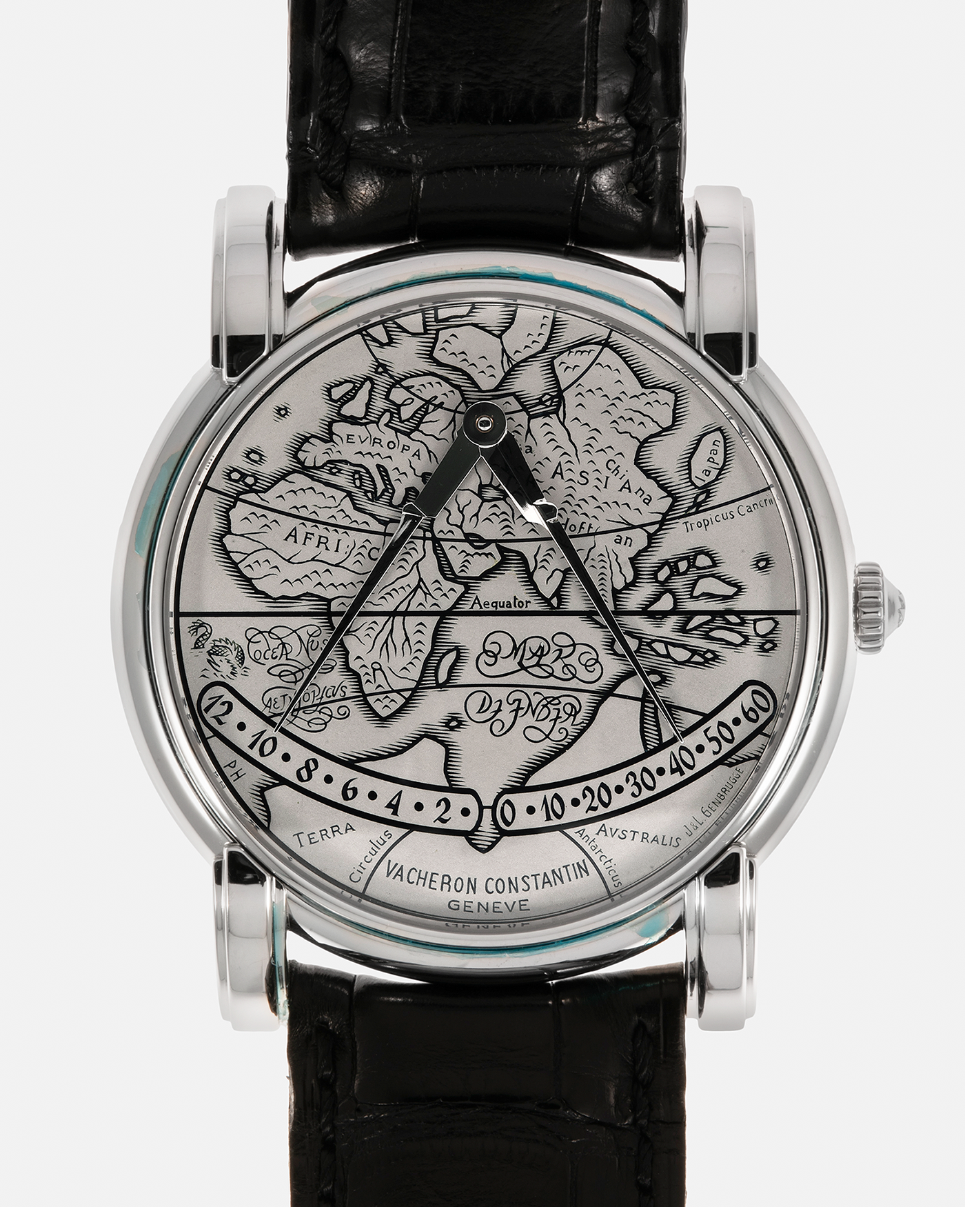 Brand: Vacheron Constantin
Year: 1990s
Model: Mercator
Reference Number: 43050
Material: Platinum 950 Case and Engraved Gold Dial filled with Black Enamel
Movement: Vacheron Constantin Cal. 1120 M (Heavily Modified Jaeger LeCoultre Cal. 920), Self-Winding
Case Diameter: 36mm x 9mm (Lug-to-Lug 41mm)
Lug Width: 19mm
Strap: Vacheron Constantin Black Alligator Leather Strap with Signed Platinum 950 Deployant Clasp