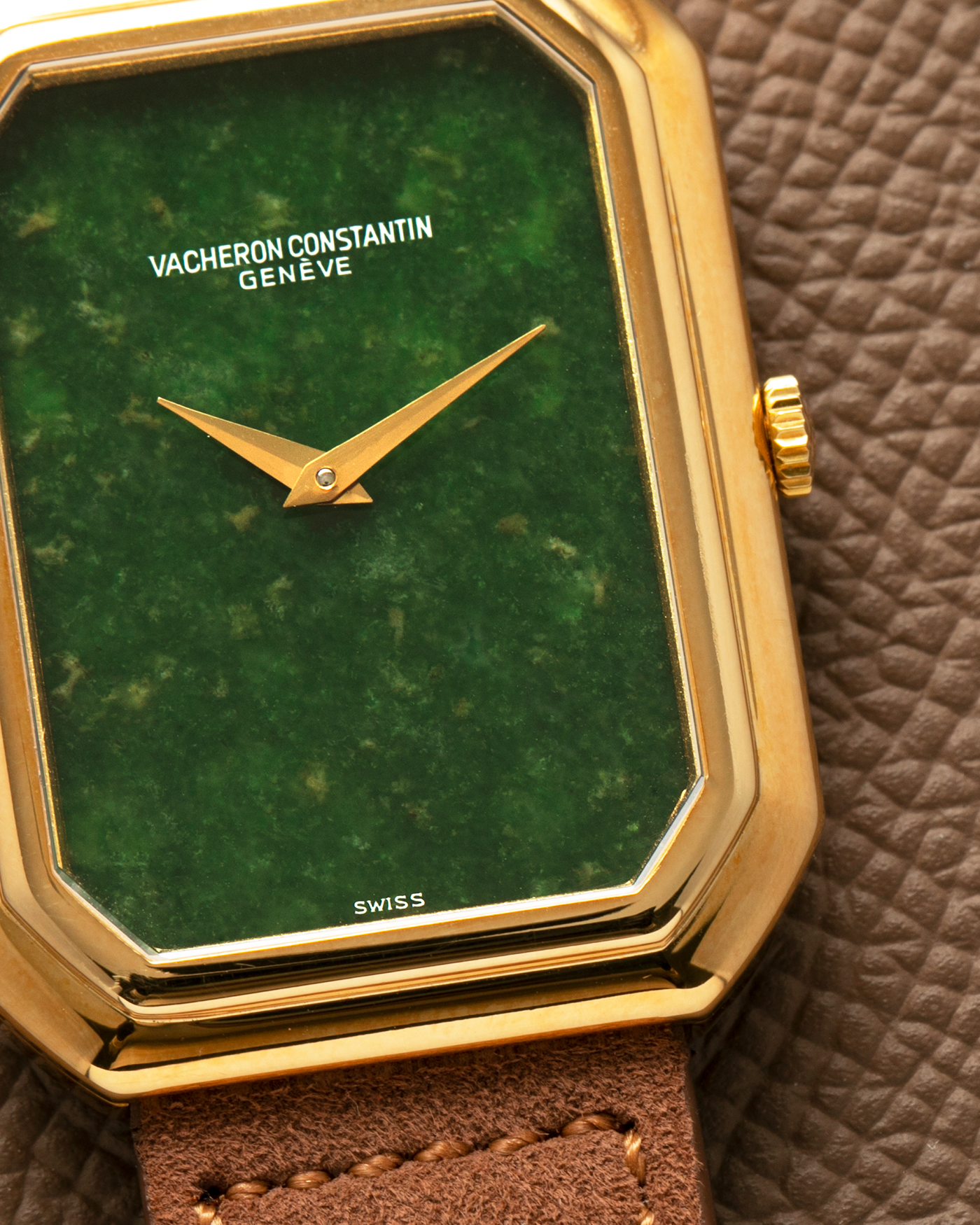 Brand: Vacheron Constantin
Year: 1970s
Reference: 2077
Material: 18-carat Yellow Gold Case, Jade Dial
Movement: Vacheron Constantin Cal. K1014 (Based on Jaeger LeCoultre Cal. 818), Manual-Winding
Case Dimensions: 38mm (Including Lugs) x 29mm x 6.5mm
Lug Width: 18mm
Strap: Molequin Brown Suede Leather Strap with Generic Gold Tang Buckle