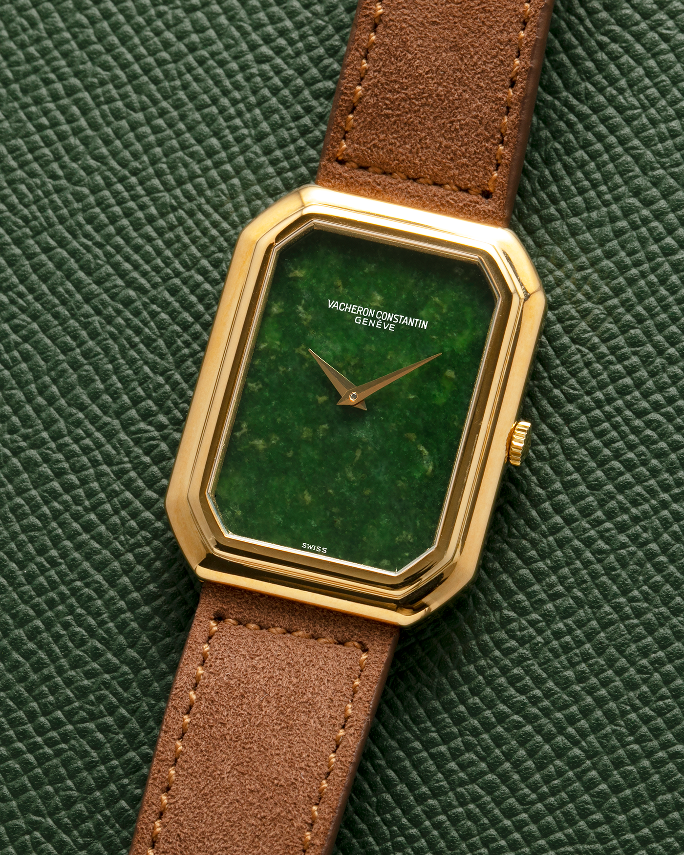 Brand: Vacheron Constantin
Year: 1970s
Reference: 2077
Material: 18-carat Yellow Gold Case, Jade Dial
Movement: Vacheron Constantin Cal. K1014 (Based on Jaeger LeCoultre Cal. 818), Manual-Winding
Case Dimensions: 38mm (Including Lugs) x 29mm x 6.5mm
Lug Width: 18mm
Strap: Molequin Brown Suede Leather Strap with Generic Gold Tang Buckle