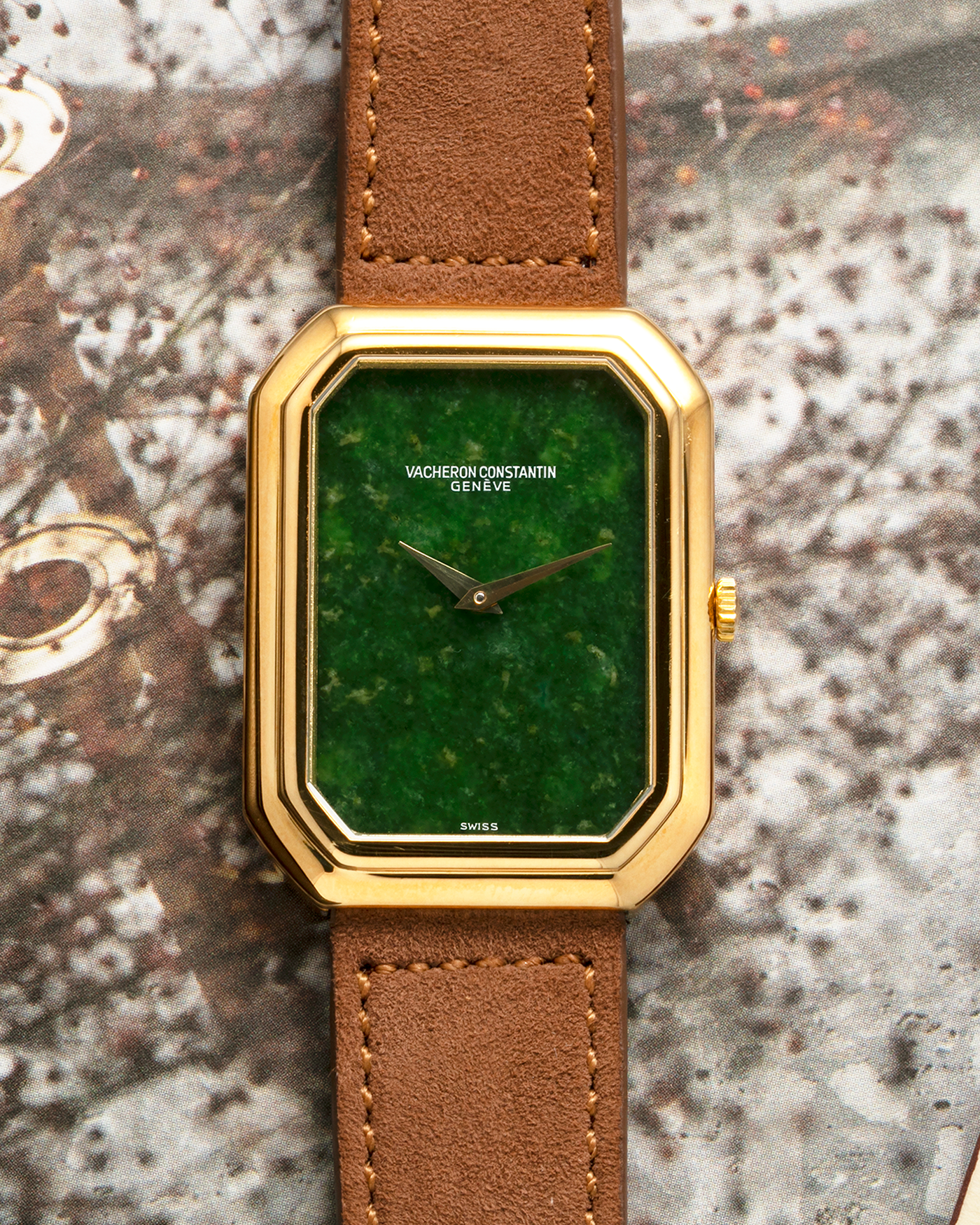 Brand: Vacheron Constantin
Year: 1970s
Reference: 2077
Material: 18-carat Yellow Gold Case, Jade Dial
Movement: Vacheron Constantin Cal. K1014 (Based on Jaeger LeCoultre Cal. 818), Manual-Winding
Case Dimensions: 38mm (Including Lugs) x 29mm x 6.5mm
Lug Width: 18mm
Strap: Molequin Brown Suede Leather Strap with Generic Gold Tang Buckle