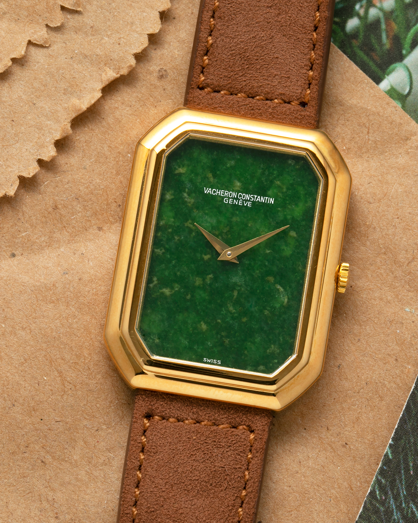 Brand: Vacheron Constantin
Year: 1970s
Reference: 2077
Material: 18-carat Yellow Gold Case, Jade Dial
Movement: Vacheron Constantin Cal. K1014 (Based on Jaeger LeCoultre Cal. 818), Manual-Winding
Case Dimensions: 38mm (Including Lugs) x 29mm x 6.5mm
Lug Width: 18mm
Strap: Molequin Brown Suede Leather Strap with Generic Gold Tang Buckle