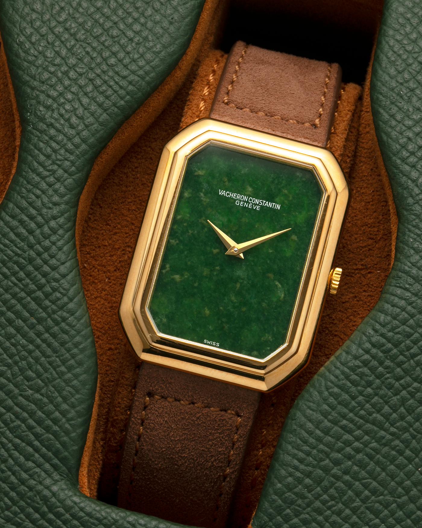 Brand: Vacheron Constantin
Year: 1970s
Reference: 2077
Material: 18-carat Yellow Gold Case, Jade Dial
Movement: Vacheron Constantin Cal. K1014 (Based on Jaeger LeCoultre Cal. 818), Manual-Winding
Case Dimensions: 38mm (Including Lugs) x 29mm x 6.5mm
Lug Width: 18mm
Strap: Molequin Brown Suede Leather Strap with Generic Gold Tang Buckle