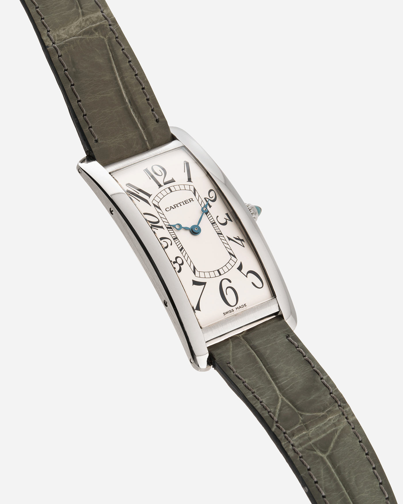 Brand: Cartier Year: 2005 Model: CPCP Collection Prive Tank Cintree Reference: 2843 Material: Platinum Movement: Jaeger Le Coultre manual wind caliber 9770MC Case Diameter: 46 x 23 mm Strap: Moss Green Alligator Strap with Platinum Cartier Deployant Clasp