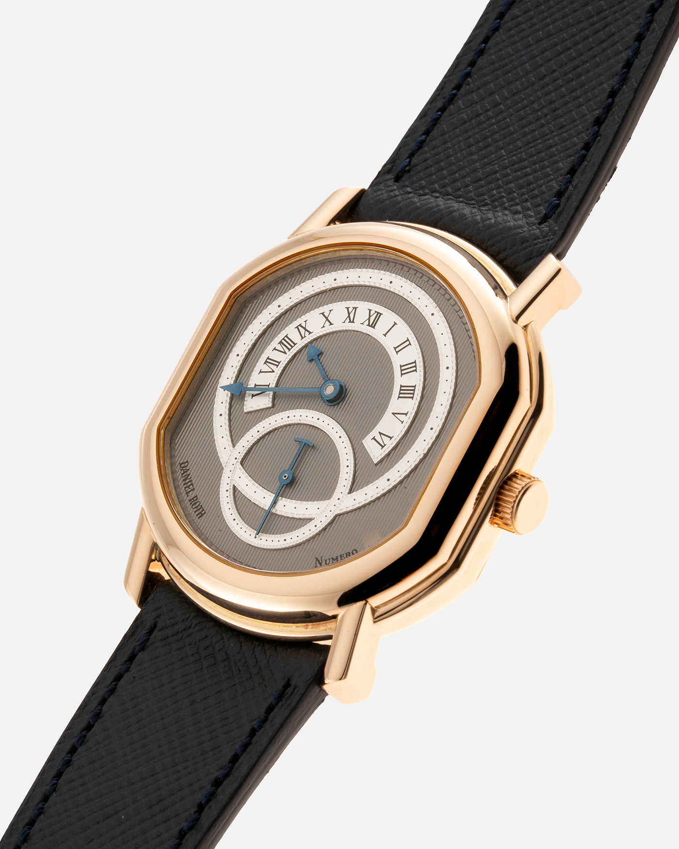 Brand: Daniel Roth Year: 1990’s Model: C127 Material: 18k Yellow Gold Movement: Lemania 27LN with Retrograde Function Case Diameter: 35mm X 38mm Strap: Molequin Navy Blue Textured Calf Strap and 18k Yellow Gold Daniel Roth Tang Buckle