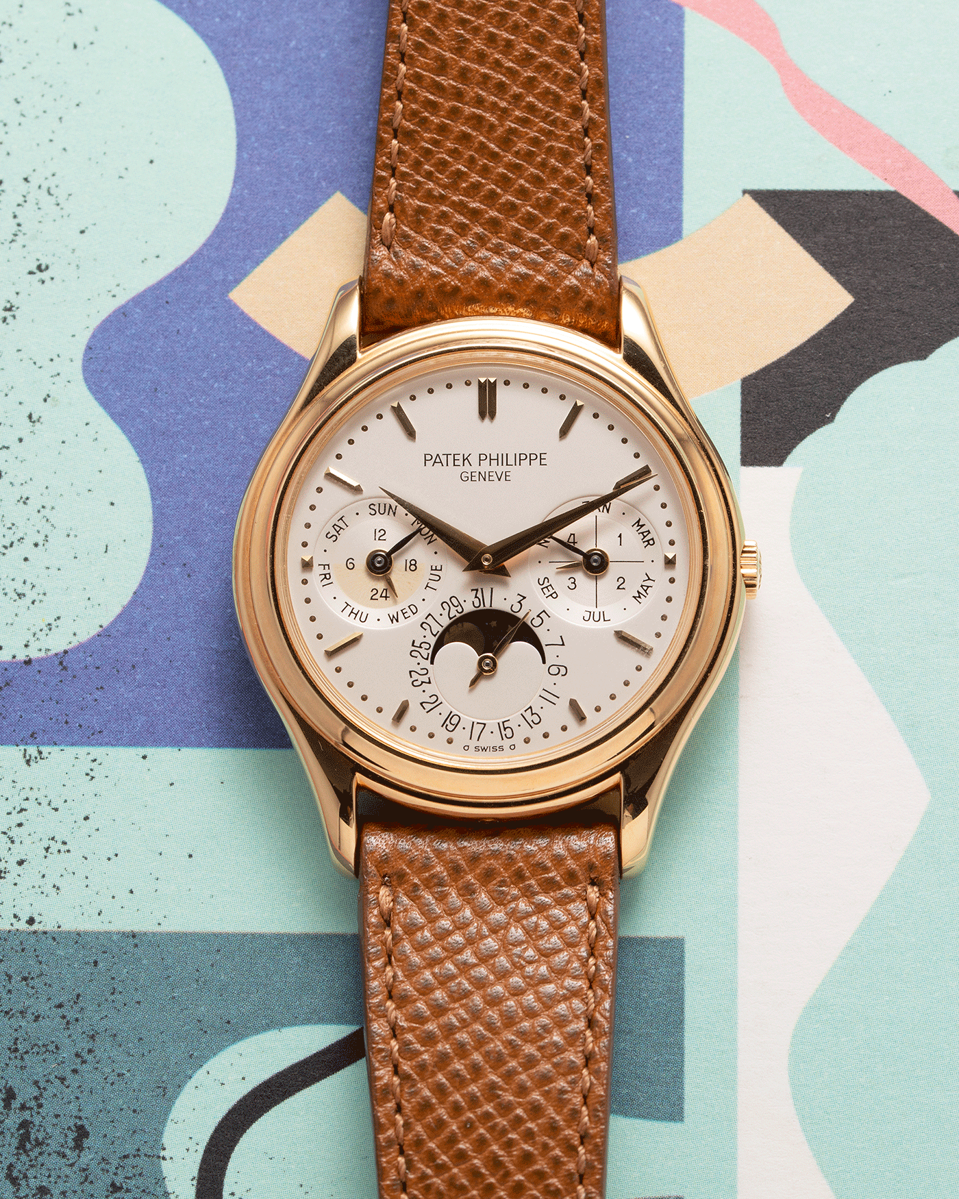 Brand: Patek Philippe Year: 1990’s Model: Perpetual Calendar Reference Number: 3940J Material: 18k Yellow Gold Movement: Cal 240Q Case Diameter: 36mm Bracelet: A Collected Man Chestnut Brown Textured Calf Strap and Patek Philippe Chestnut Brown Alligator Strap with 18k Yellow Gold Patek Philippe Tang Buckle