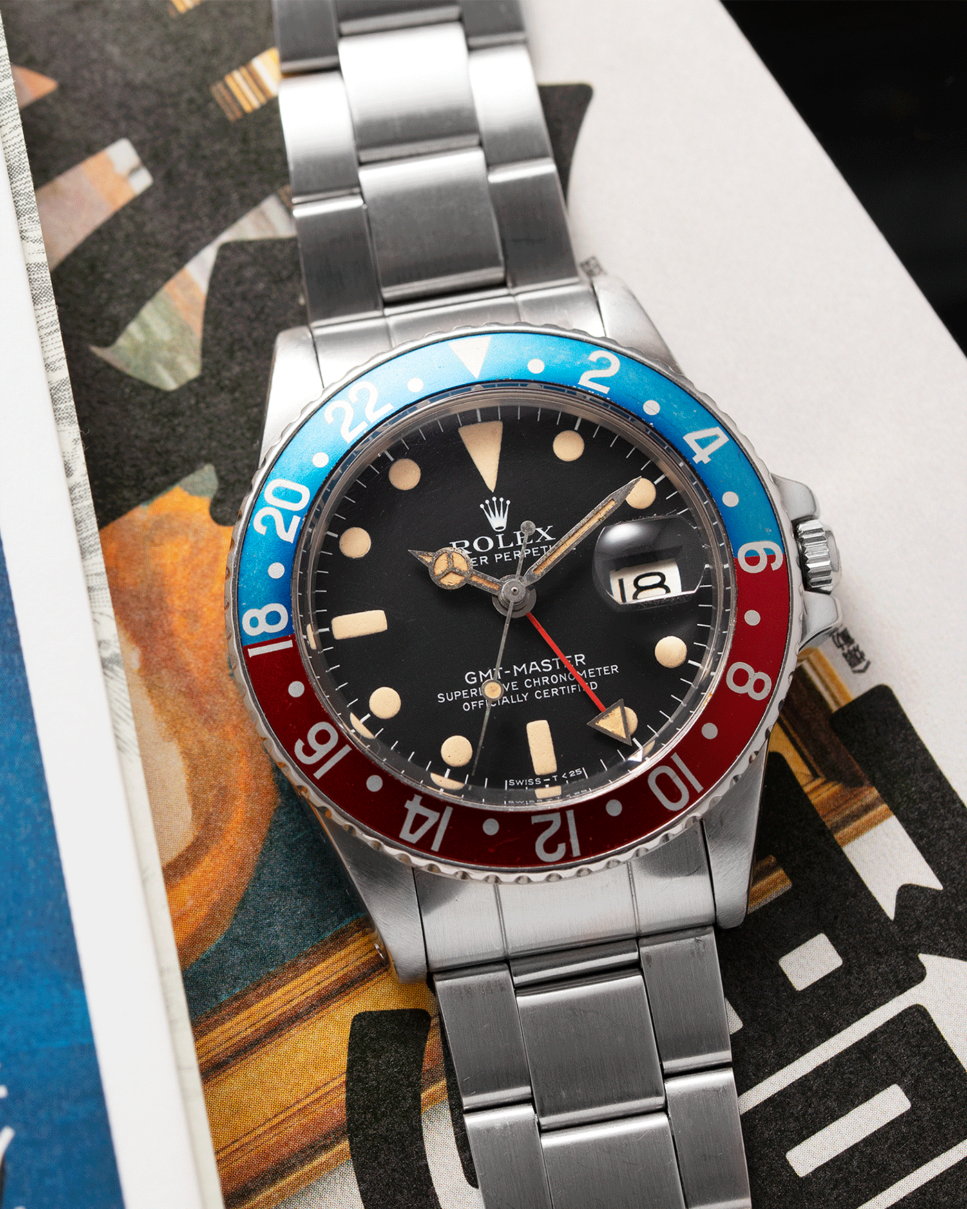 Brand: Rolex Year: 1978/79 Model: GMT-Master Reference Number: 1675 Serial Number: 5,73X,XXX Material: Stainless Steel Movement: Cal. 1570 Case Diameter: 40mm Lug Width: 20mm Bracelet: Rolex 7836 Folded Oyster Bracelet with ‘358’ end links